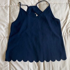 Navy blue blouse with open back design.